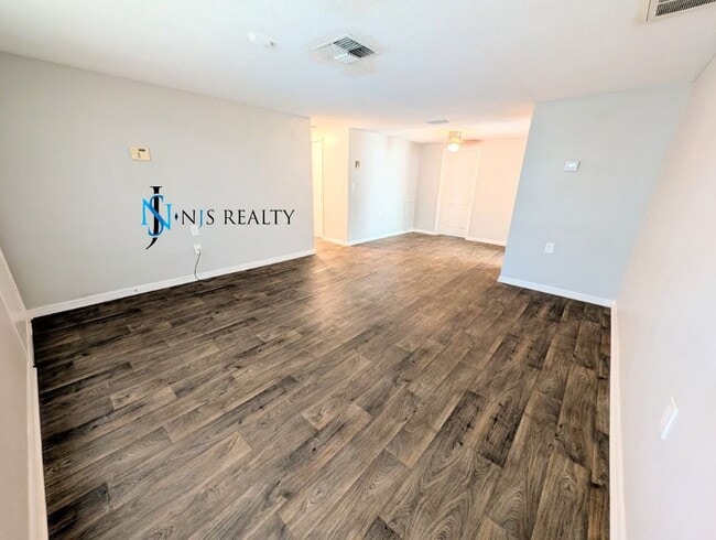 Photo - Check out this 3/1.5/1 1113 Sq. Ft. with UPDATED bathrooms and kitchen with GRANITE, LARGE backya...