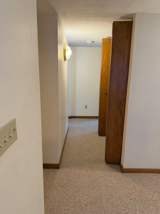 Hallway to bedrooms 1 & 2 - 304 3rd St NE Unit Apt A