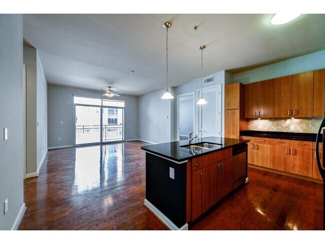 Kitchen and Living Room - 711 Cosmopolitan Dr NE Condo