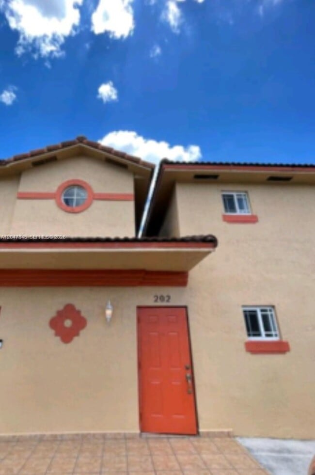 Building Photo - 17318 NW 74th Ave Unit 202
