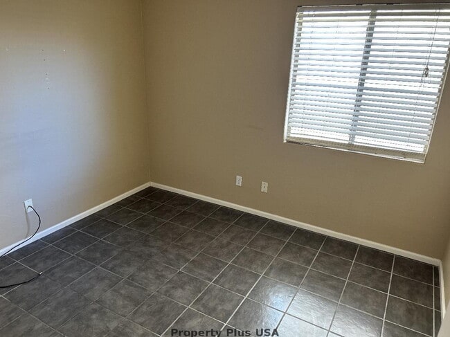 Photo - "Charming 3-Bed Oasis with 2 Baths in Maricopa – Cozy 1,276 Sq Ft Haven!"