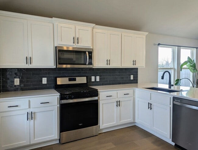 Photo - Spacious Yukon Home with Storm Shelter, 2-Car Garage & Fenced Yard!