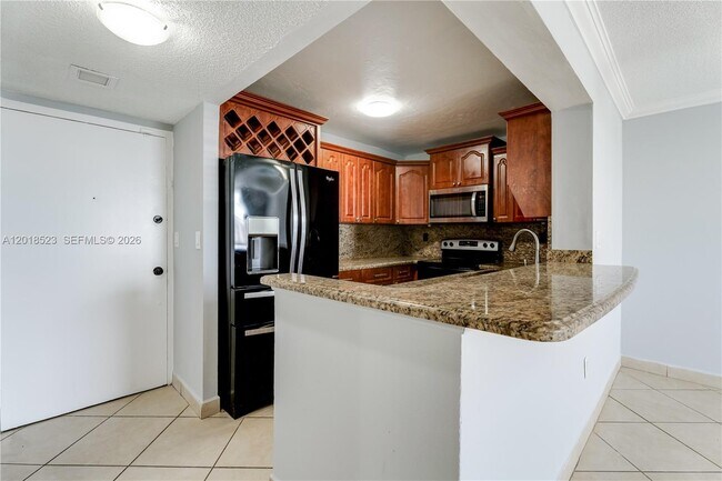 Photo - 5775 W 20th Ave Unit 404