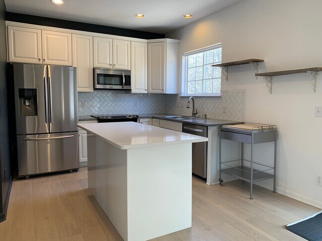 Photo - Renovated 5 Bedroom Home w/ 2 Car Garage and Fenced Backyard