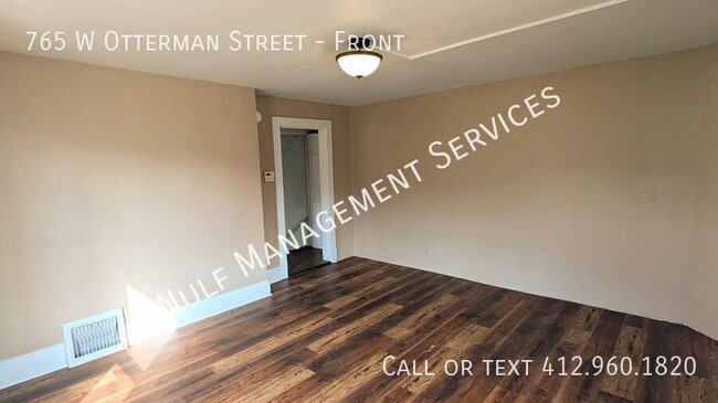 Photo - 765 W Otterman St Unidad Front