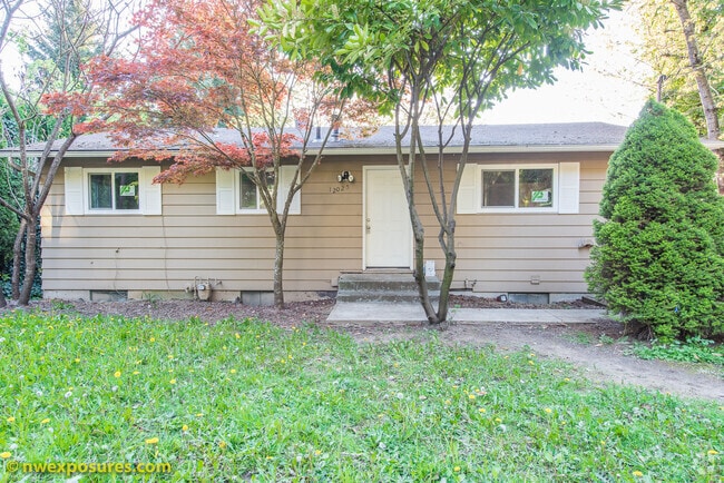 Building Photo - Charming 4-Bedroom Home with Dual Decks an...