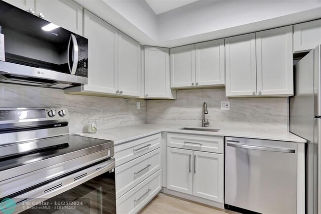 Photo - 899 SE 2nd Ave Condo Unit 119