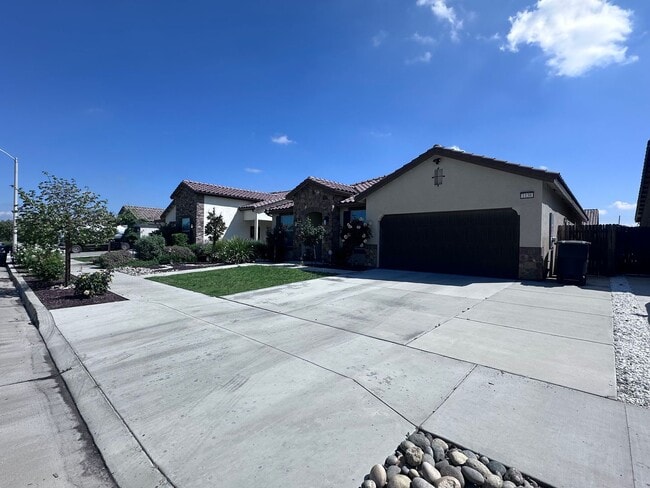 Building Photo - SE Visalia home coming soon! Equipped w/ Solar & Tesla charger