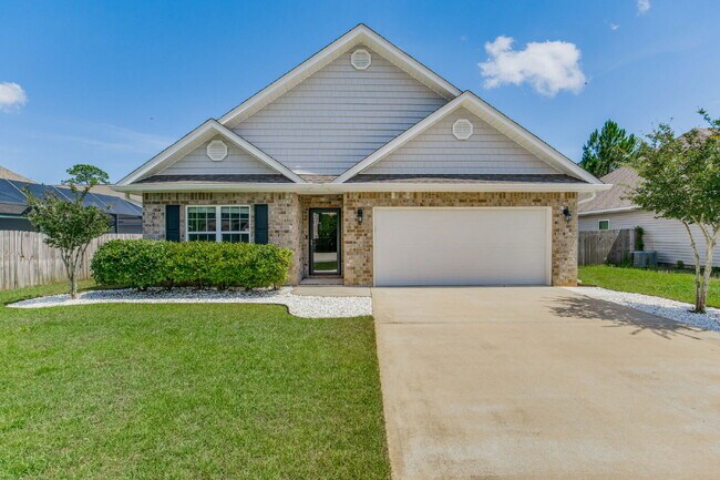 Building Photo - Welcome to this exquisite 4-bedroom, 2-bat...