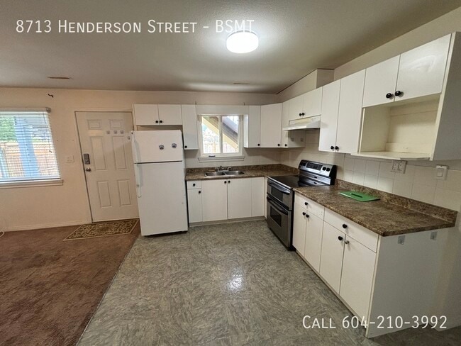 Building Photo - Basement Suite with Parking Unit BSMT