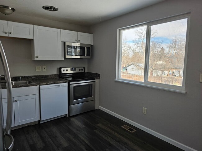 Photo - 4 Bedroom Bi Level with Large Yard and 2 Car Garage