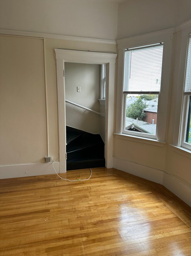 Staircase in living room leading to extra room in attic - 2738 Garber St Unit Cinnabar