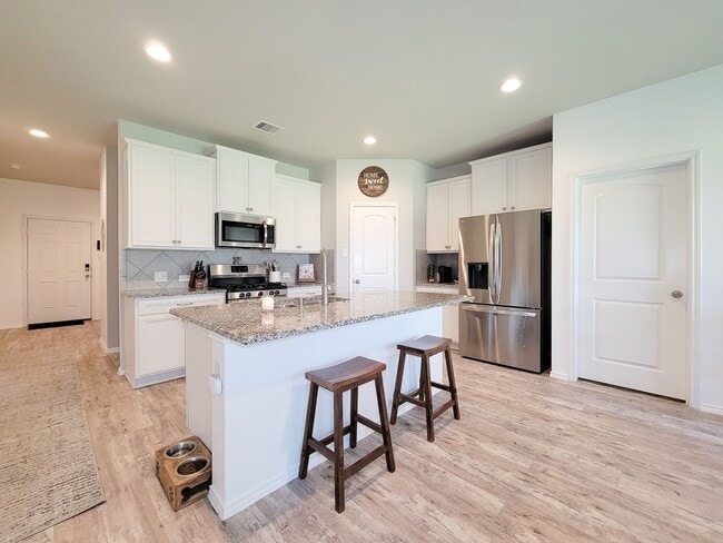 Photo - Experience tranquility in this impressive single-story, three-bedroom, two-bath home in Barton Wo...