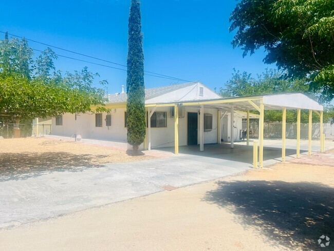 Building Photo - Charming 3-Bedroom Home with Wood Ceilings...