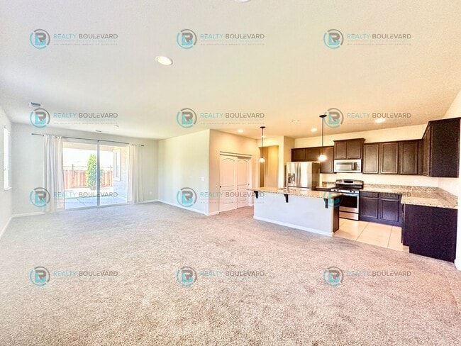 Photo - 3 Bedroom 2 Bathroom with Garage covered patio and beautiful yard!