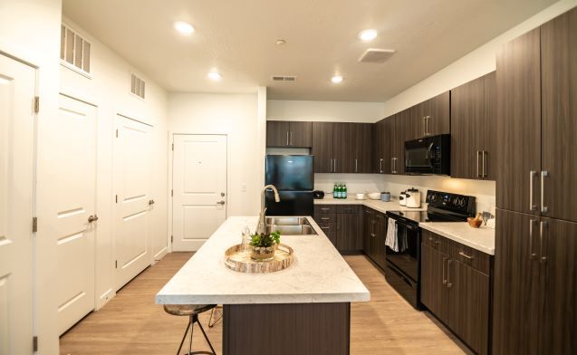 Large Kitchen with Island at Garden Lofts Apartments - Garden Lofts Apartments