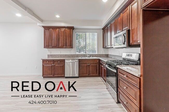 Building Photo - 6829 Simpson Ave Unit 1