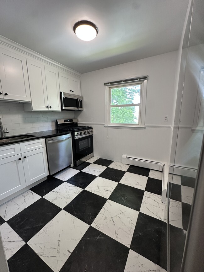 Photo - 79 Broadway Unit Bright 2BR 2nd floor of private house