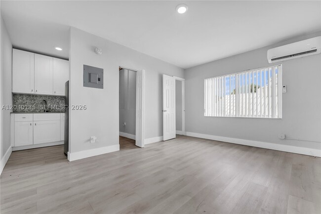 Building Photo - 6647 SW 59th St Unit 206