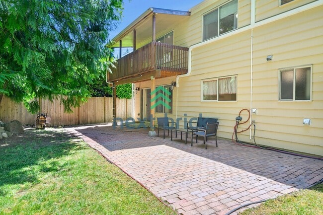 Building Photo - Discover Spacious Comfort for multi-generational living: 4-Bedroom Home with additional kitchenet...