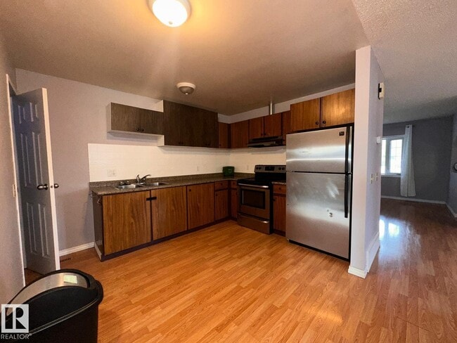 Photo - 2114-2152 52 St NW
