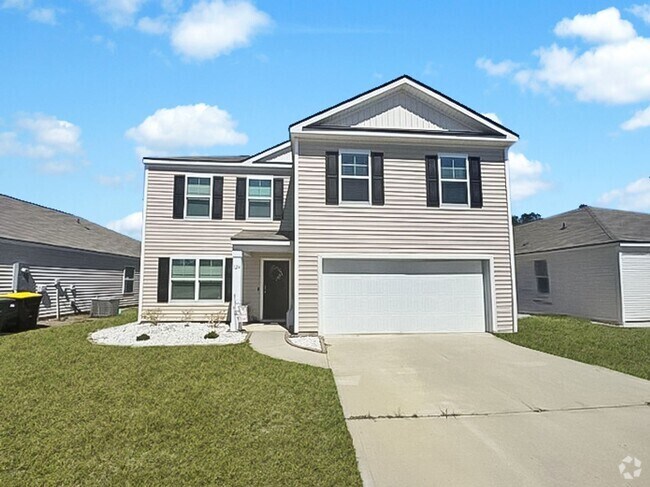 Building Photo - 4 bedroom, 2.5 bathroom 2-story home at Th...