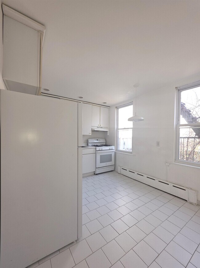 Photo - 10 66th St Unidad 2B