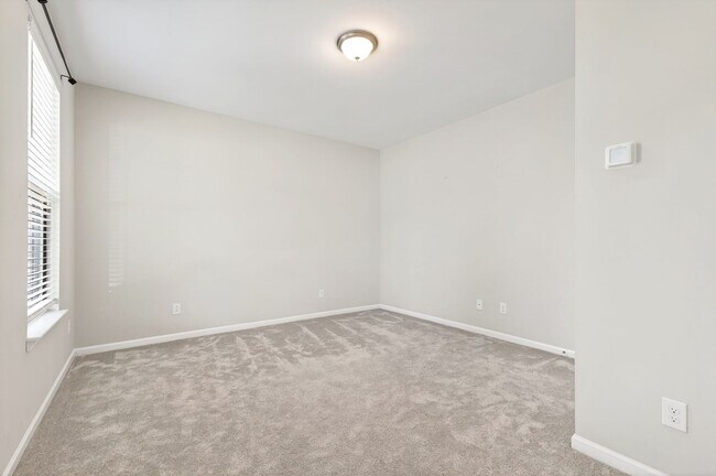 Photo - Beautiful 4BR End-Unit Townhome in Prime Apex Location!