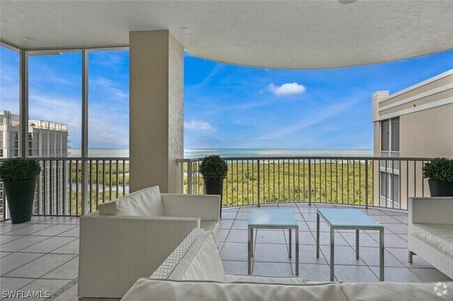 Building Photo - 7117 Pelican Bay Blvd Unit 1903 Rental