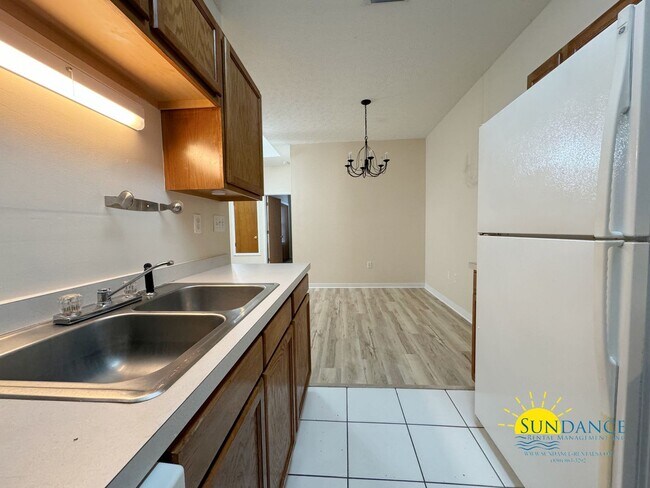 Photo - 2 Bed Home in FWB with New LVP Flooring & Private Backyard!