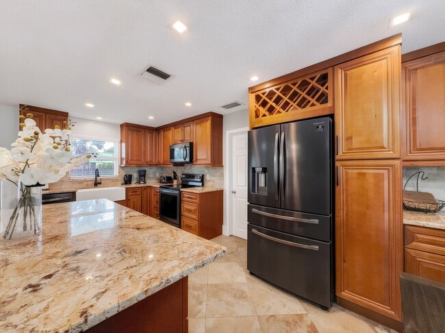 Photo - Discover the perfect Naples Park rental just minutes from the beach.