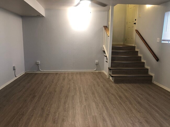 Living room and front door. (2 large windows bring in light) 17ft x 14ft - 105 W 2nd St Lower