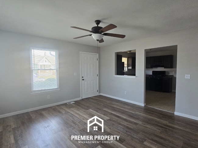 Photo - Charming 3BR Home in St. Louis | Hardwood Floors, Bright Living Space & W/D Hookups