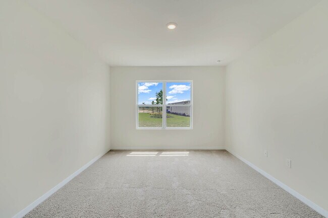Photo - 4 bedrooms and 2 bathrooms, the spacious 1,828 sq ft home features an open concept with a 2 car g...