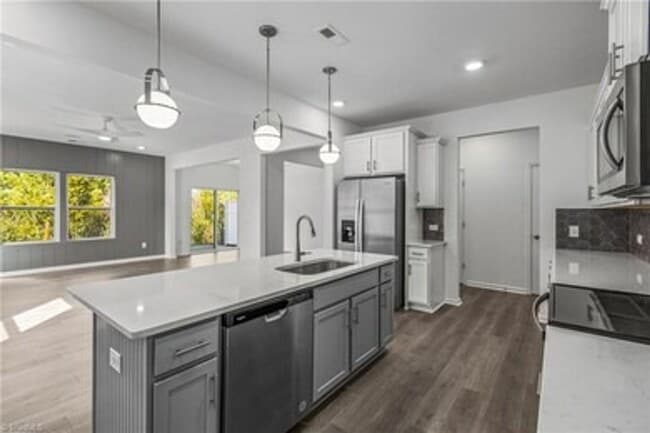 Photo - Spacious 3-Bedroom Townhome with Private Patio, Central HVAC & In-Unit Laundry Hookups