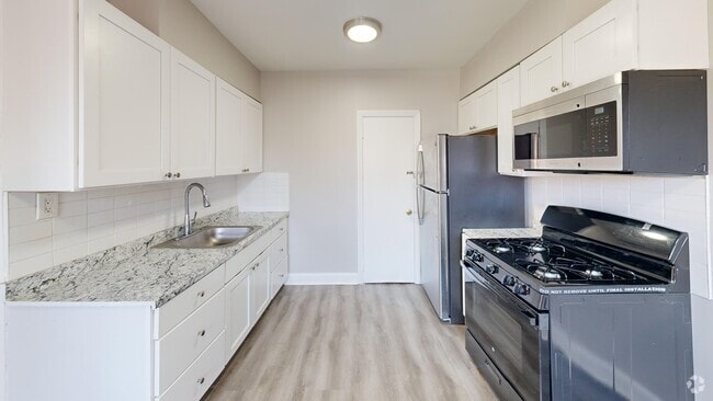 Kitchen of a 2-bedroom apartment - Wynmawr Court Apartments