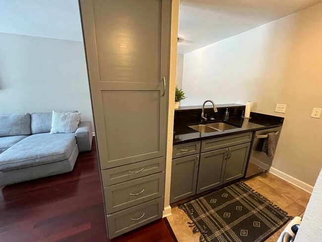 Photo - Live in the Heart of SoCo | Furnished Condo with Pool & Gym