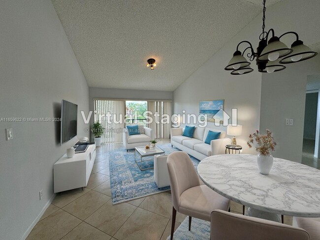 Photo - 8955 Wiles Rd Condo Unit 308