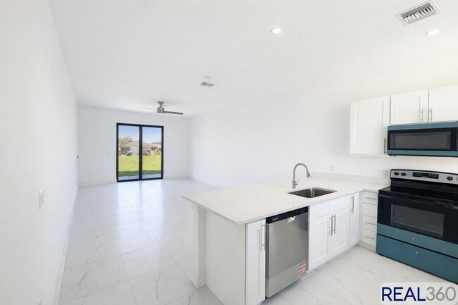 Building Photo - 1125-1127 Homer Ave S Unit 1125