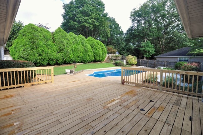 Photo - Large home with a pool.