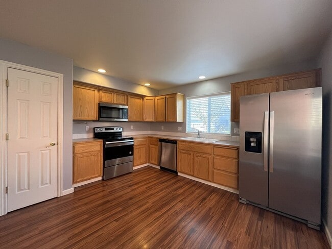 Photo - Elegant Two-Story Home with Open Floor Plan, Gas Fireplace & Large Backyard