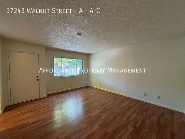 Photo - 37243 Walnut St Unit A-C
