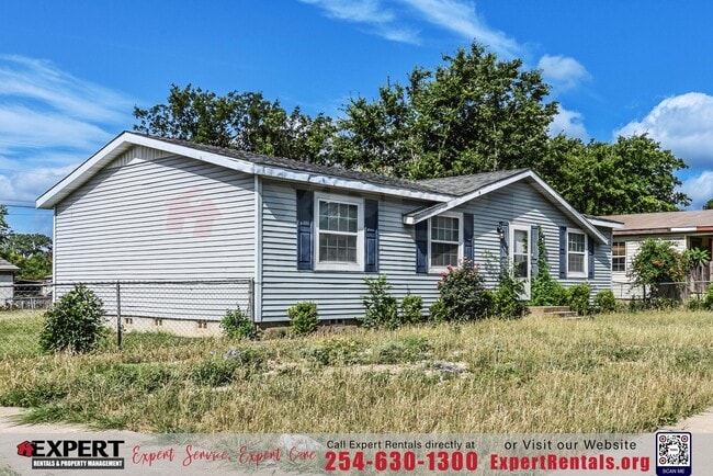 Photo - A cozy 3-bedroom, 2-bathroom home nestled on a corner lot