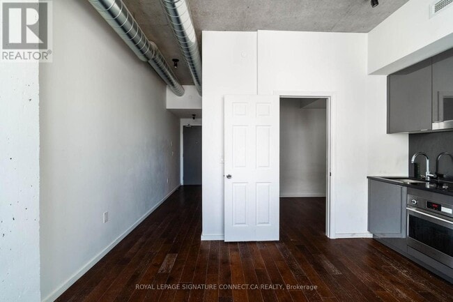 Photo - 21 Lawren Harris Square Unit 910