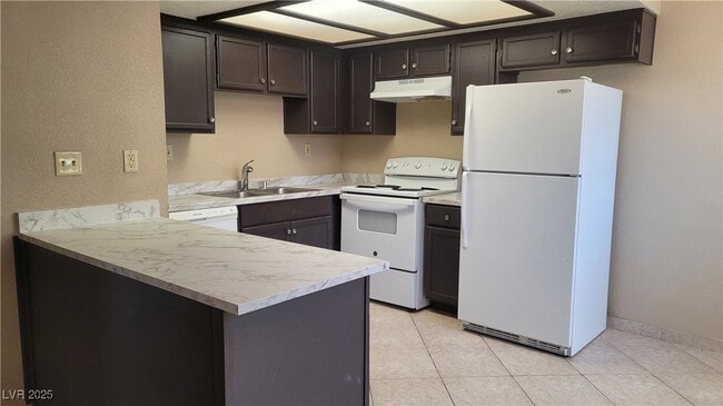 Building Photo - 1209 N Buffalo Dr Unit 102 Rental