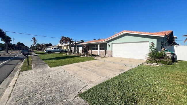 Photo - IMMACULATE 4 Bedroom, 2 Bathroom Home in Cocoa Beach!! ONLY MINUTES from the Beach!! (Lawn Care I...
