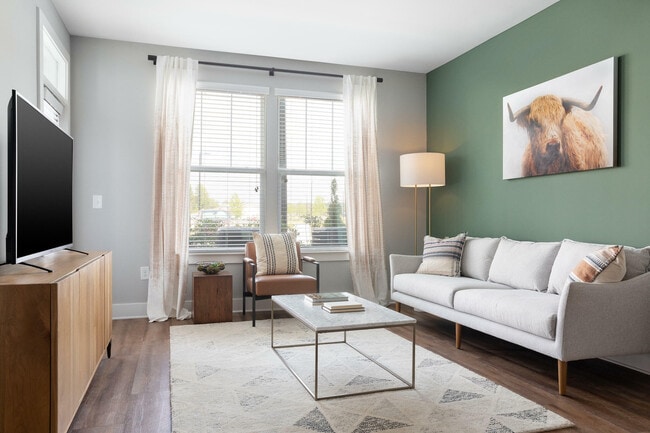 Unwind in this serene and stylish living room, where comfort meets contemporary design. - Lemmond Farm