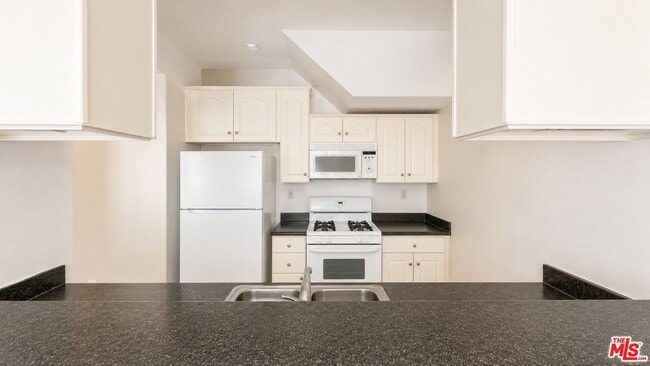 Photo - 15200 Sherman Way Unit 104