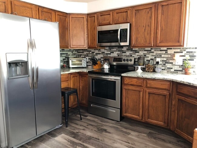 Photo - Beautiful renovated 4 Bedroom Rancher in D-12 with Cheyenne Mtn. Views, close to Ft. Carson!