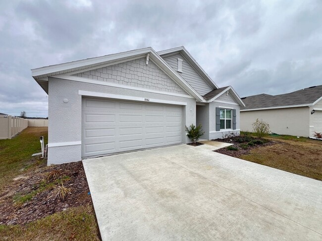 Photo - 4BD/2BA Modern Comfort Meets Suburban Serenity in Ocala! WASHER & DRYER INCLUDED! FULLY FENCED HOME!